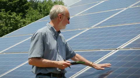 Expert Energy Engineer Counting Solar Power Panels Stock Footage 39641373