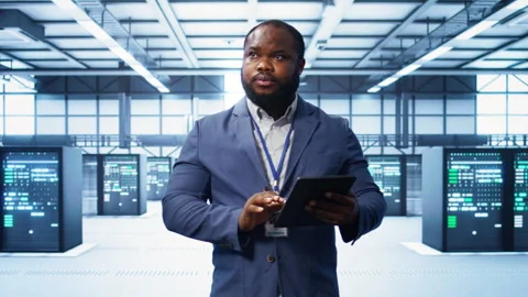 Expert ensuring optimal performance and data integrity in server hub Stock Footage 277663269