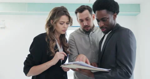 With expert knowledge, the African real estate agent showcases the strategic Stock Footage 277682511
