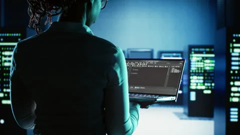 Expert runs code in data center Stock Footage 250291905