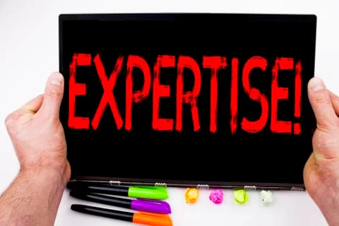 Expertise text written on tablet, computer in the office with marker, pen, st Stockfoto's