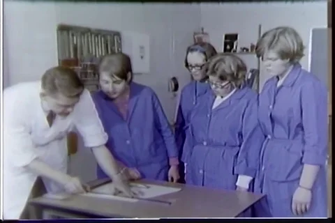 Expertise train female worker in workshop Stock Footage 99098712