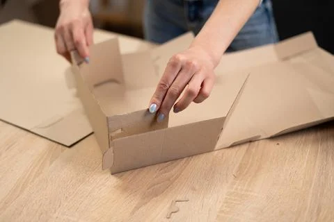 Expertly packing boxes. efficient business logistics and packaging services.  Stock Photos