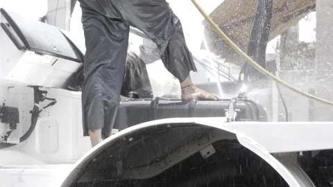 Expertly Washing - Efficient Engine Maintenance Stock Footage 314432210