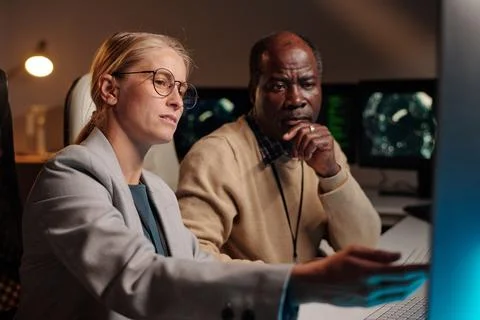 Explaining colleague how to decode data Stock Photos