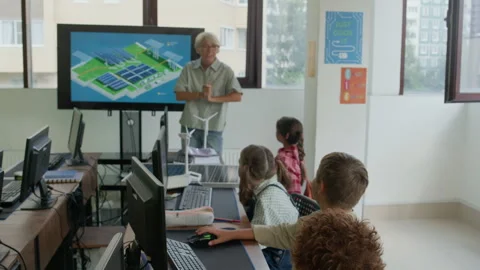 Explaining Schoolkids How and Where Can Be Used Alternative Sources of Energy Stock Footage 316481025