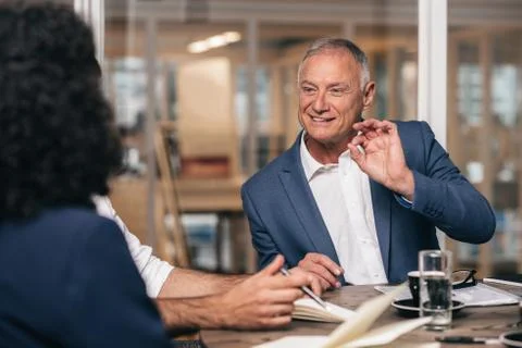 Explaining the steps to success in detail Stock Photos
