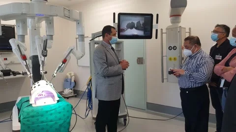 EXPLAINING THE SURGERY ROBOT AT GROOTE SCHUUR HOSPITAL Stock Footage 162915296