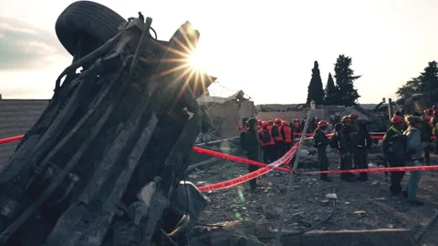 The exploded car, and sun rays at a missile falling site. Stock Footage 332736264