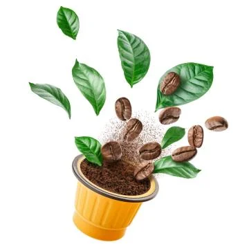 Exploded view of coffee grinder with roasted beans and leaves Stock Photos