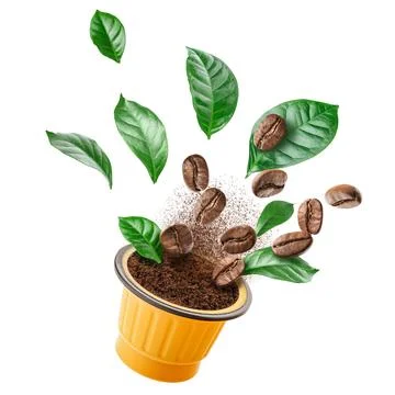 Exploded view of coffee grinder with roasted beans and leaves Foto stock