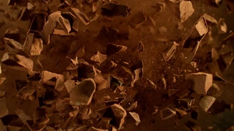 Exploding and Rotating Chocolate Chunks Stock Footage 248059265
