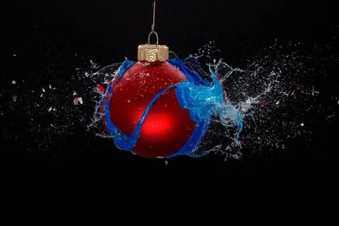An exploding bauble. Concept for a ruined holiday An exploding bauble. Con... Stock Photos