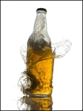 Exploding beer bottle 스톡 사진