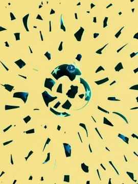 Exploding black bauble on yellow background Stock Photos