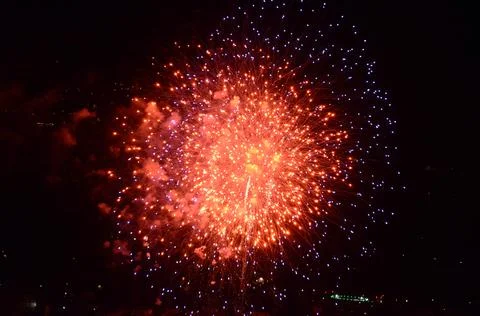 Exploding bright red light above the Gravedona in Italy Stock Photos