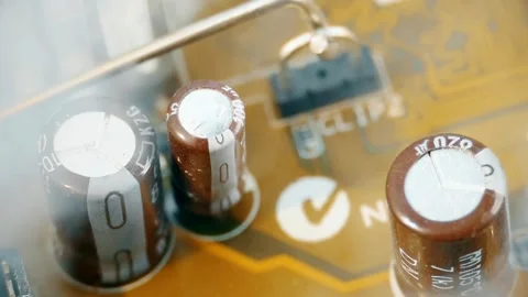Exploding Capacitor and Smoking Chips on a Computer Motherboard. Stock Footage 318444830