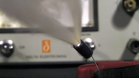Exploding Capacitor. Ultra slow motion hispeed  5000fps Video stock 92991037