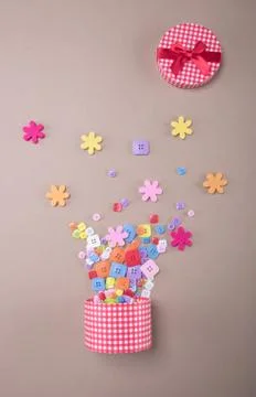 Exploding celebration red checkered gift box. Holidays concept. Stock Photos