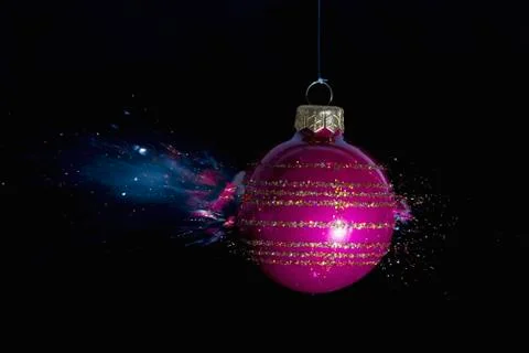 An exploding Christmas bauble Foto stock