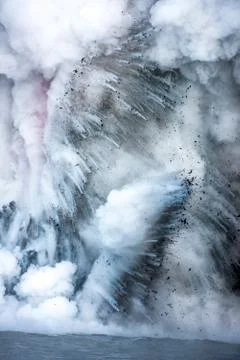 Exploding embers from molten lava Stock Photos