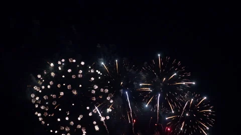Exploding firework progress in color from red to mixed red and blue to Stock Footage 197392776