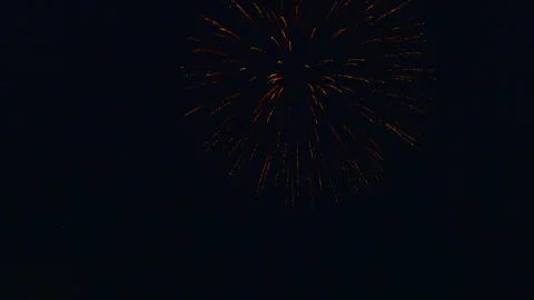 Exploding fireworks with bright colorful sparks in the night sky, Ternitz, Lower Stockbeeldmateriaal 337854899