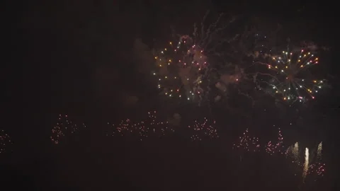Exploding Fireworks Light Up the Black Sky in a Grand Celebration Stock Footage 291902016