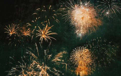 Exploding fireworks New Year background Stock Photos