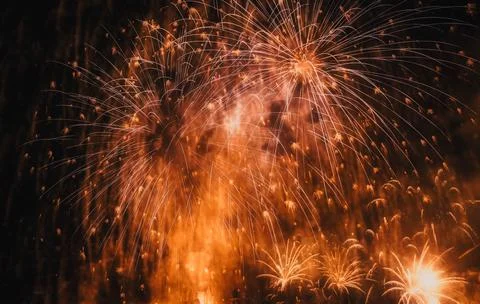 Exploding fireworks New Year background Stock Photos