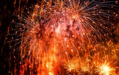 Exploding fireworks New Year background Stock Photos