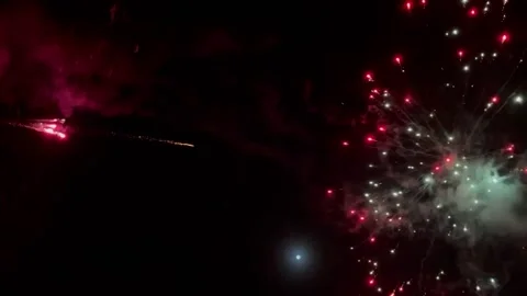 Exploding fireworks in the night sky Stock Footage 239594693