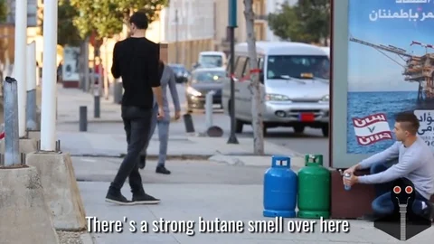 Exploding gas cylinder prank panics Beirut passers-by Video stock 106315616