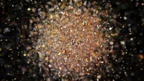 Exploding gold confetti Stock Footage 266907567