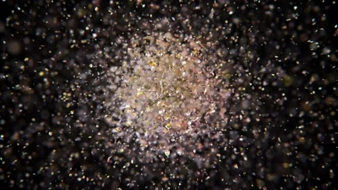 Exploding gold confetti Stock Footage 266907590