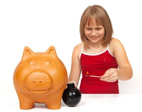 Exploding the piggy bank Stock Photos