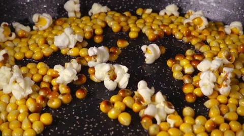 Exploding popcorn, slow motion Stock Footage 58483999