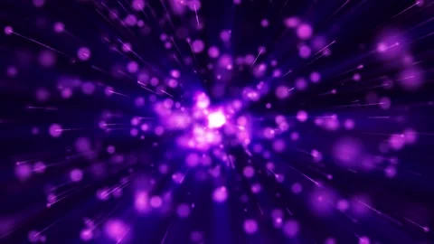 Exploding purple light particles fly away on a dark background. Dynamic Stock Footage 314060561