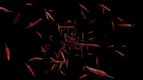 Exploding Red Chili Peppers on Black Background, Slow Motion with Alpha Chann Stock Footage 327881015