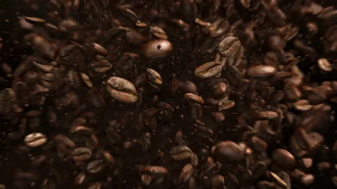 Exploding roasted coffee beans in 4K 스톡 동영상 89572579