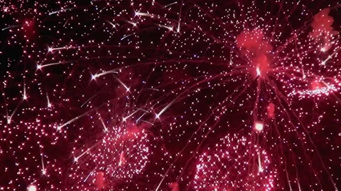 Exploding ruby brilliance a dazzling Fireworks Display at Night 스톡 동영상 315744915