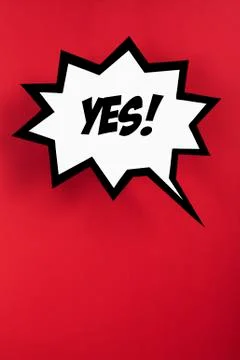 Exploding speech bubble with YES against red background 스톡 일러스트