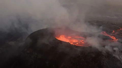 Exploding Volcanic Lava In Caldera. Erupting Volcano With Heavy Smoke. Stock Footage 158607568