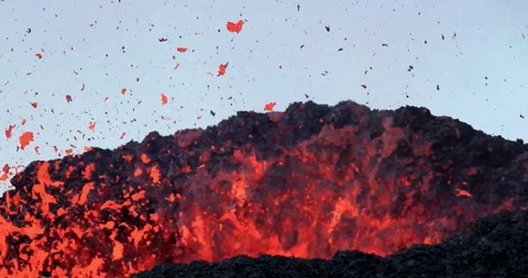 Exploding Volcanic Lava Eruption splashing out of crater molten lava Video stock 336580022
