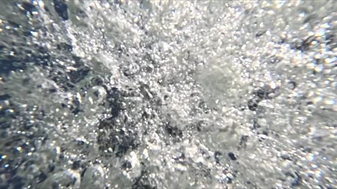 Exploding water impact with chaotic droplet motion Stock Footage 319040746