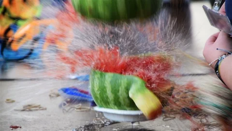 Exploding watermelon in slow motion and real time Stock Footage 112023343