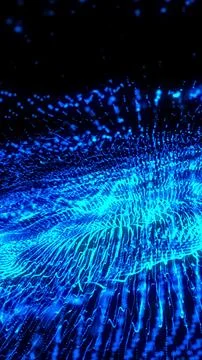 Exploding wave of luminous blue particles in motion against a dark backgrou.. 写真素材