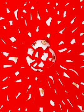 Exploding white bauble on red background Stock Photos