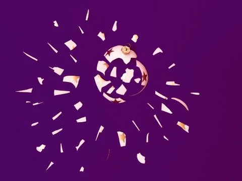 Exploding white bauble on violet background Stock Photos