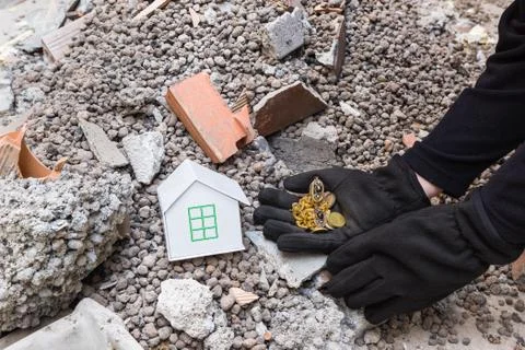 Exploiter thief loots a house devastated by earthquake Stock Photos